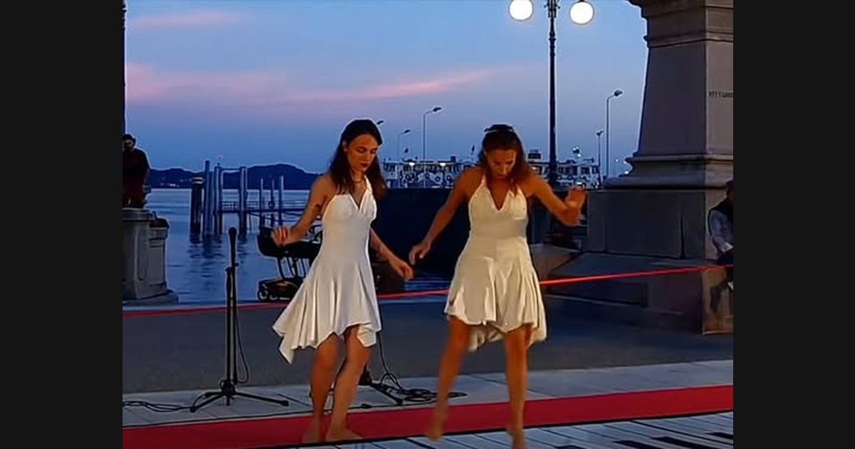 “Bohemian Rhapsody” Underfoot: Reading Il Grande Piano’s Shared Keyboard